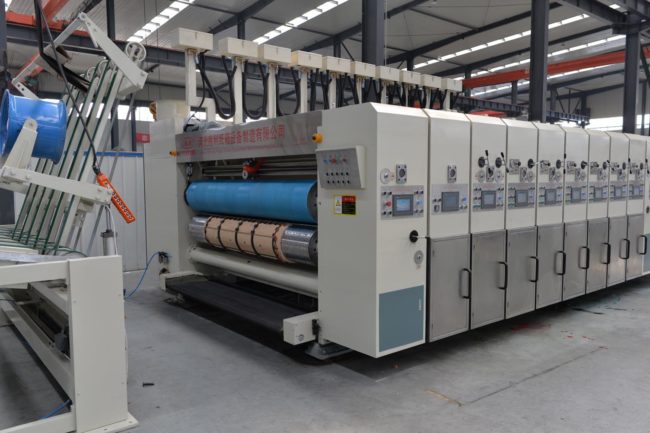 Rotary die cutting machine for corrugated carton and box