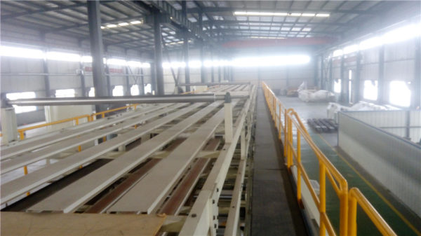 Corrugated sheet overhead bridge conveyor